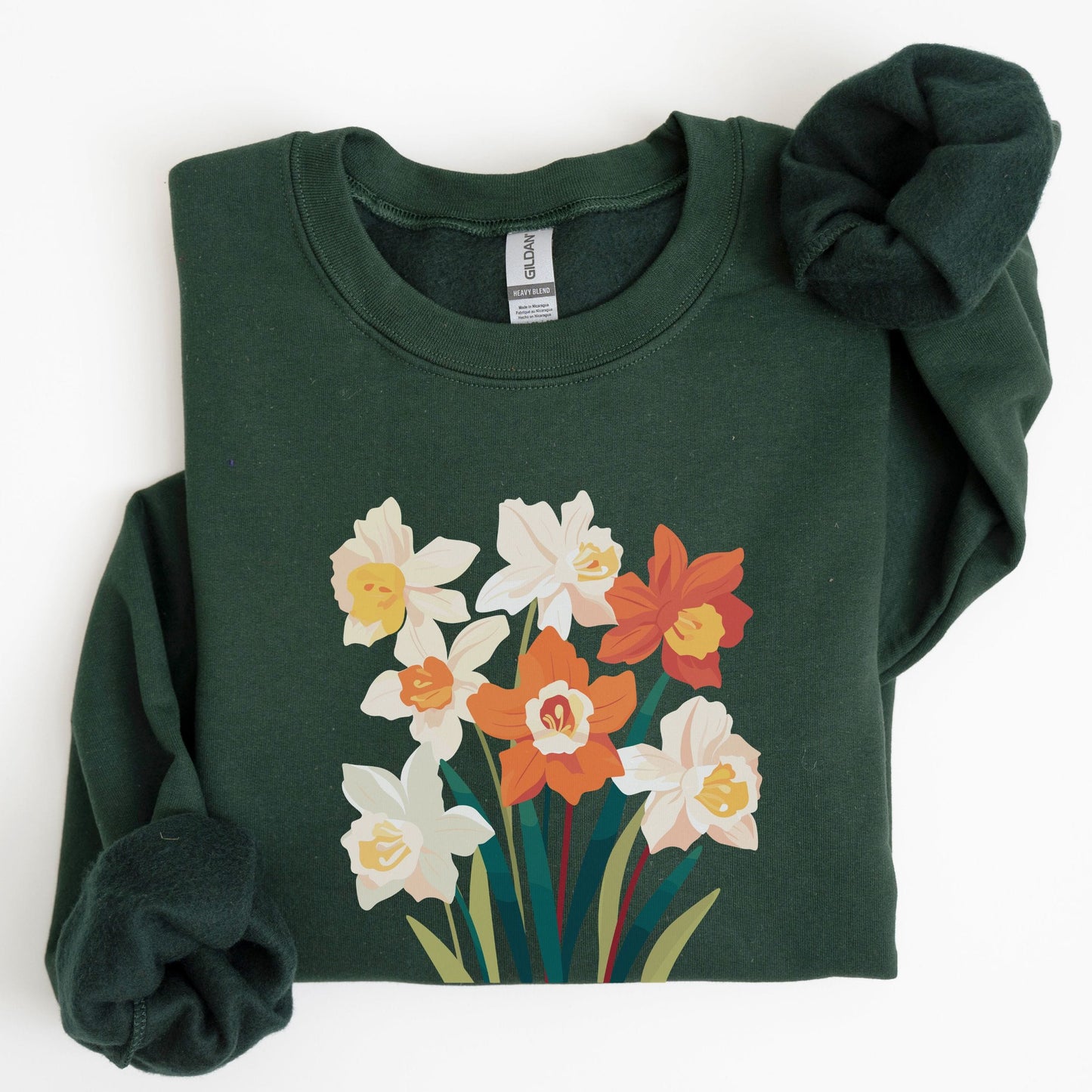 Green sweatshirt with floral design on a white background