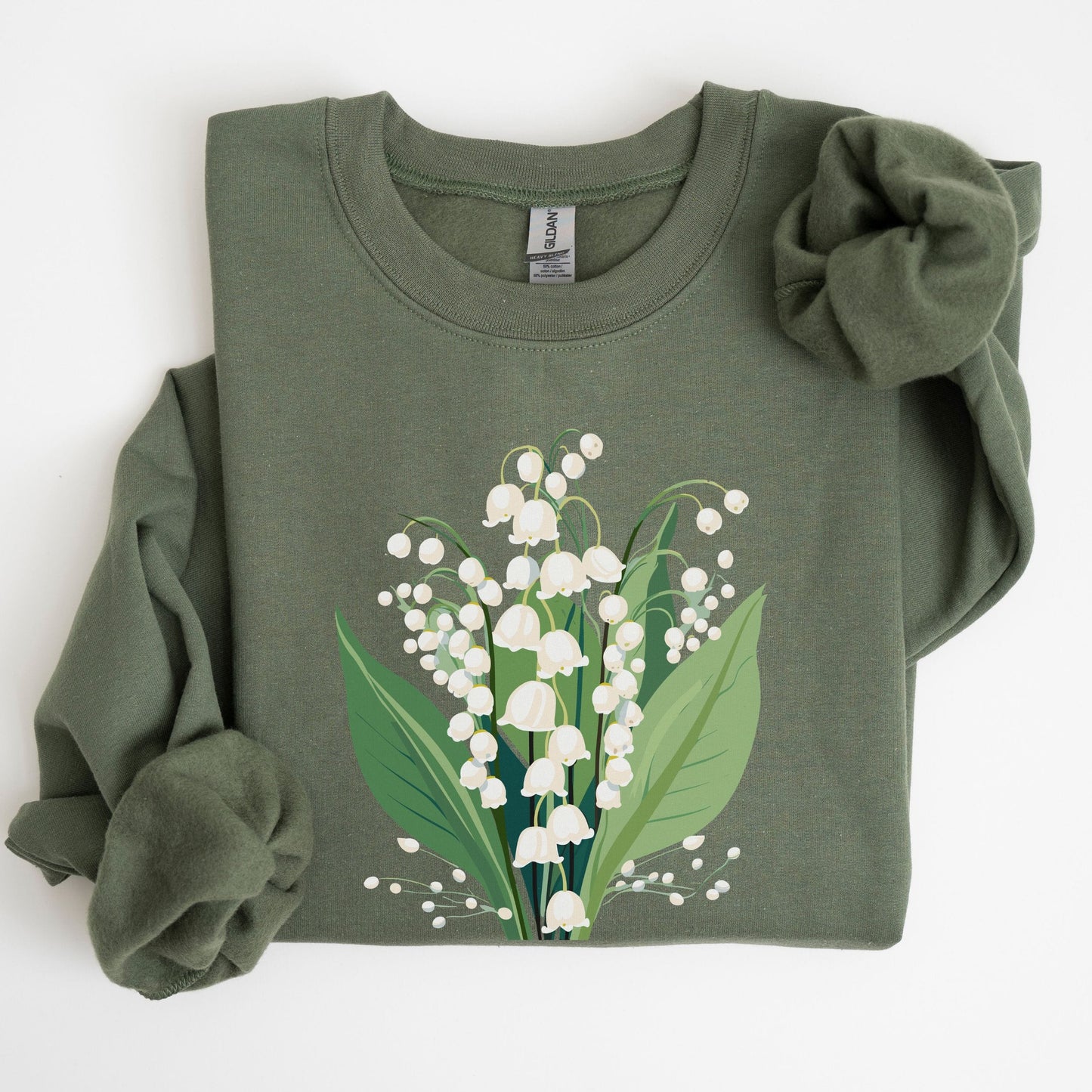 Green sweatshirt with a floral design on a white background