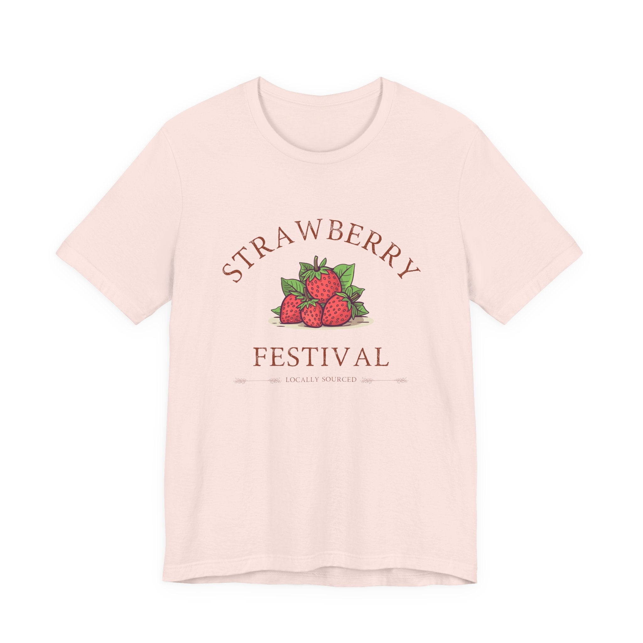 Pink t-shirt with 'Strawberry Festival' graphic on a white background