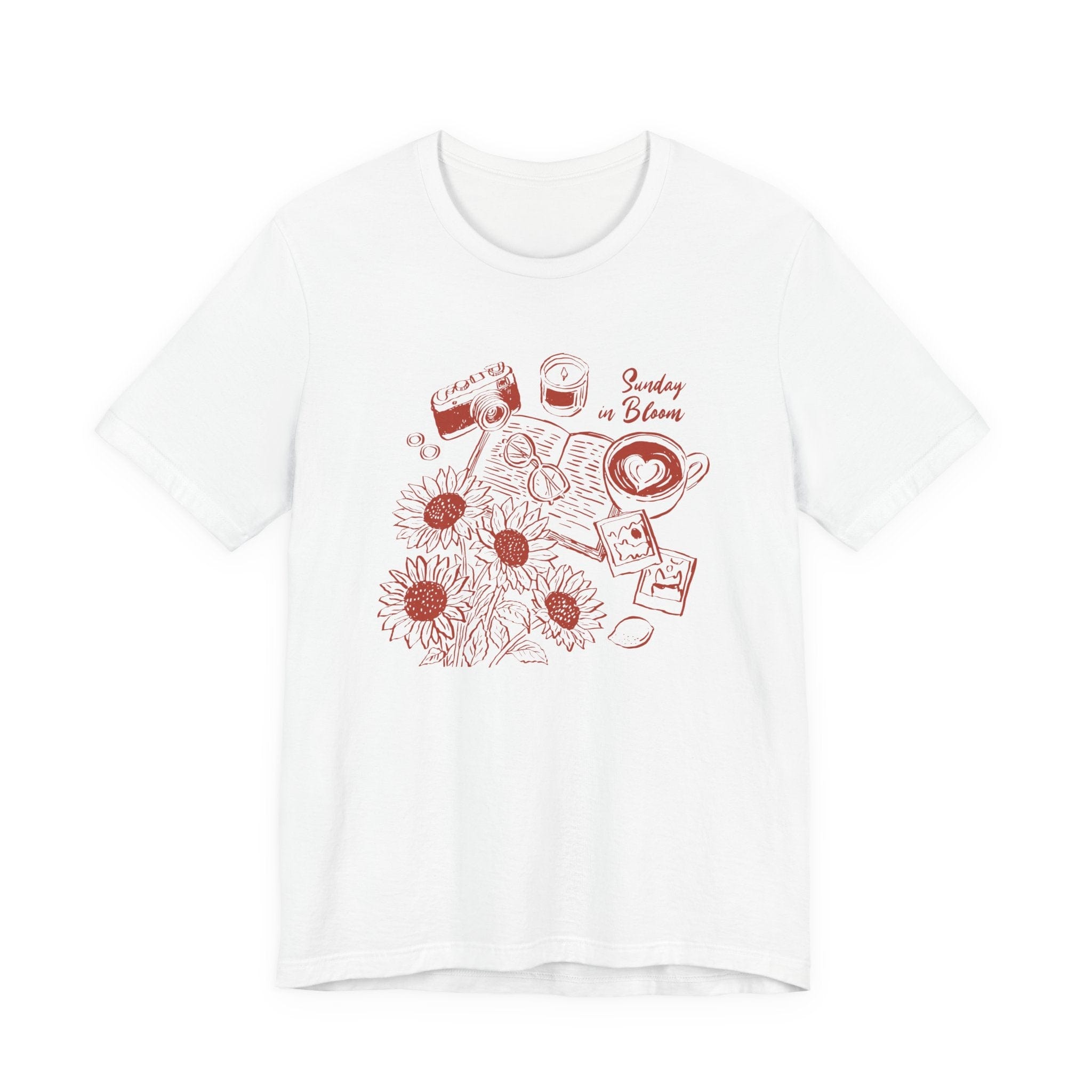White t-shirt with red floral and heart design on a white background