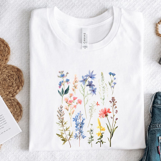 Flat lay of white t-shirt with vintage wildflower print