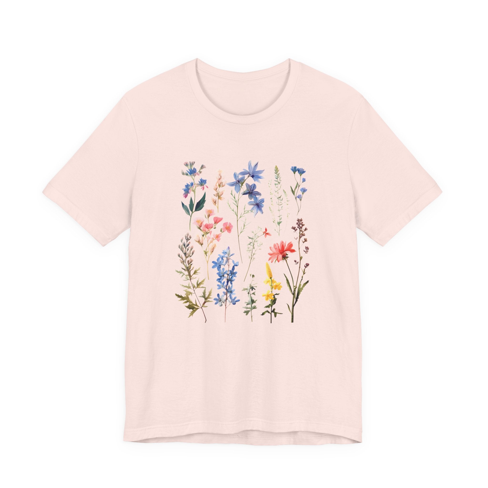 Flat lay of soft pink t-shirt with vintage wildflower print