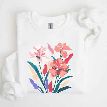 White sweatshirt with colorful floral design on a light background