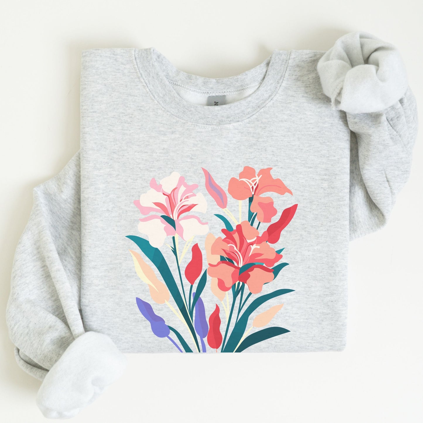 Gray sweatshirt with colorful floral design on a white background