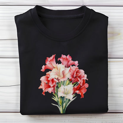 Black t-shirt with a floral design on a wooden surface