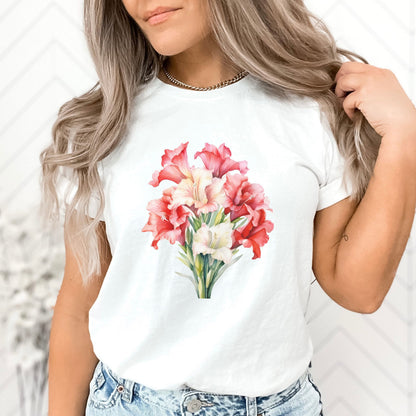 Person wearing a white t-shirt with a floral design on a blurred background