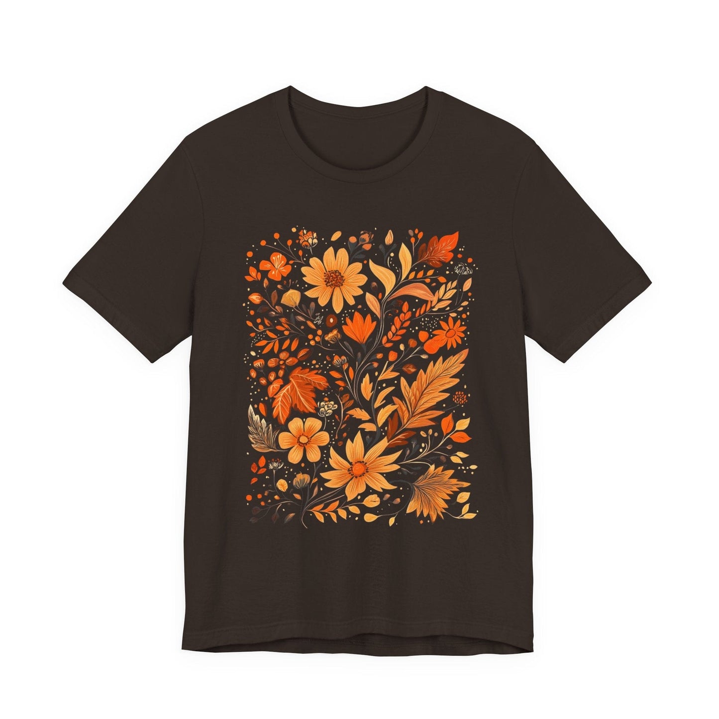 Flat lay of brown t-shirt featuring orange and gold autumn floral design