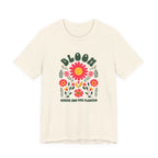 Beige t-shirt with floral design and text on a white background