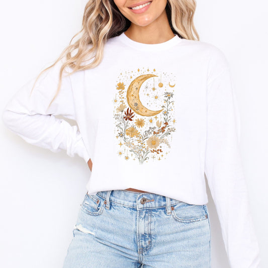White long sleeve tee with a floral moon design worn by a person, on a white background