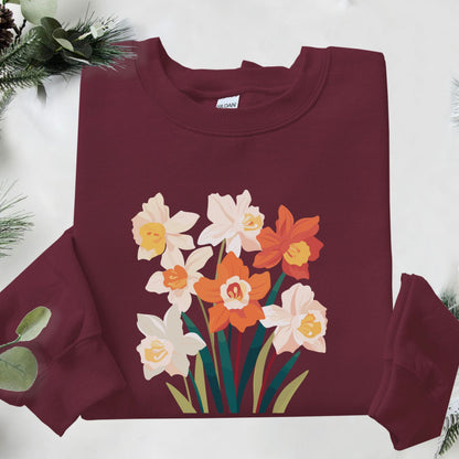 Maroon sweatshirt with floral design on a white background