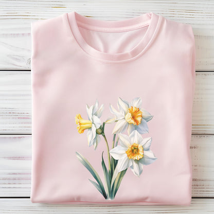 Pink t-shirt with floral design on a wooden surface