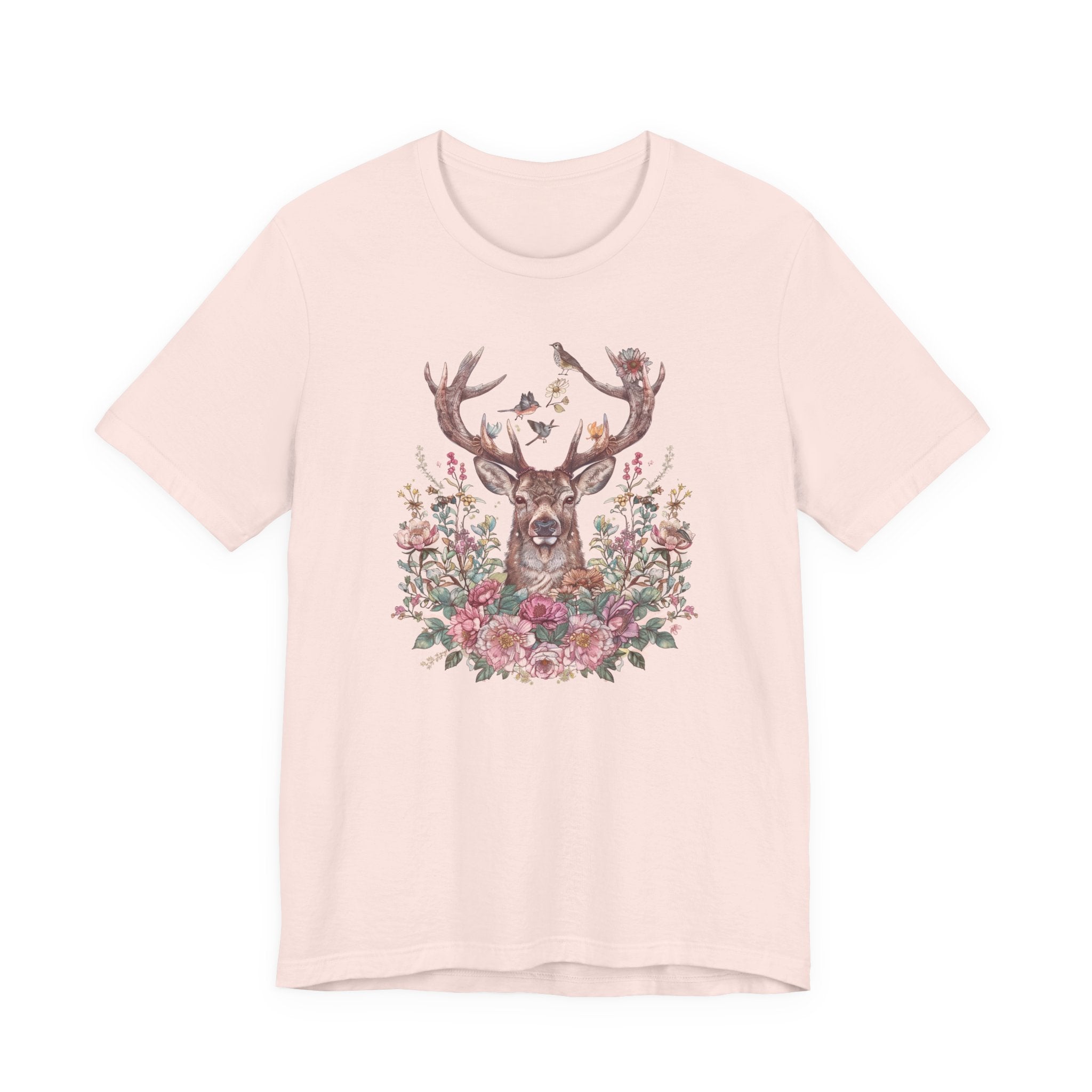 Pink t-shirt with a deer and floral design on a white background