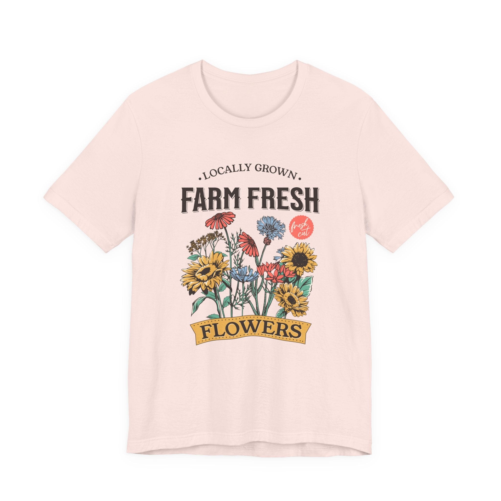 Pink t-shirt with 'Farm Fresh Flowers' graphic design on a white background