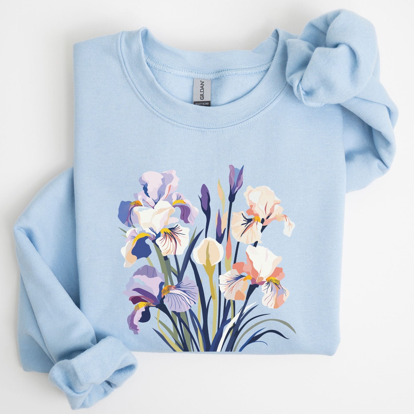 Light blue sweatshirt with floral design on a white background