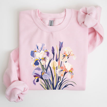 Pink sweatshirt with floral design on a light gray background