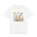 White t-shirt with a colorful floral design on a white background