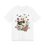 White t-shirt with a ghost reading a book and black cat design on a white background