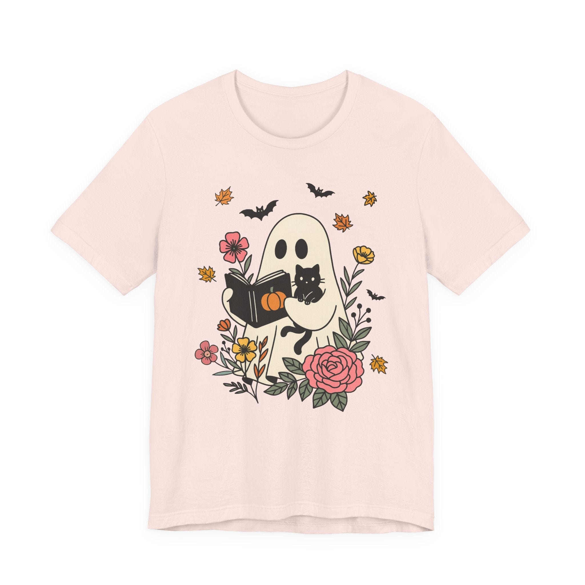 Pink t-shirt with a ghost and black cat design on a white background