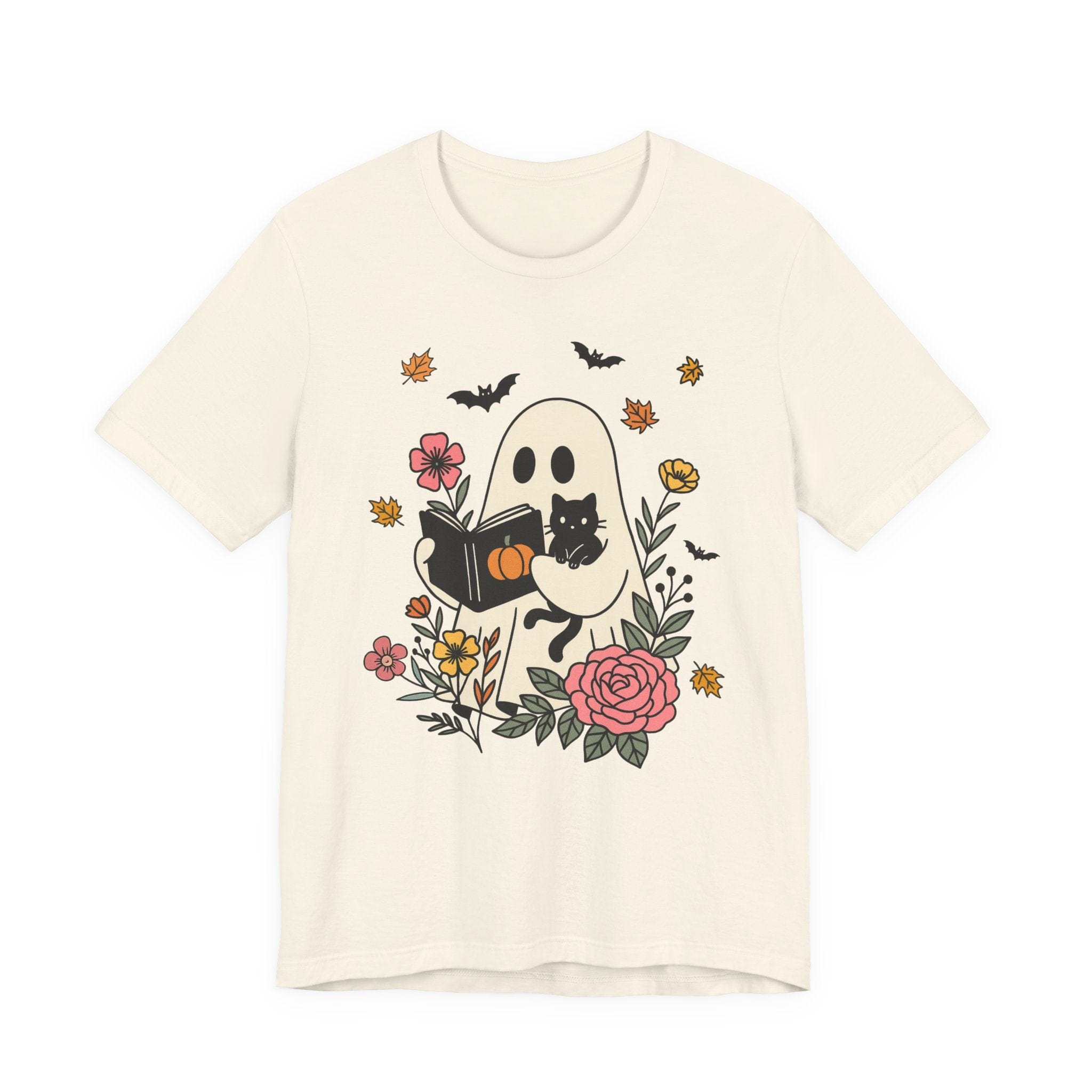 Beige t-shirt with a ghost reading a book and black cat design on a white background
