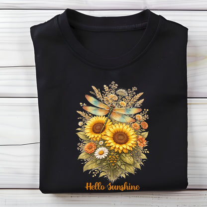 Black t-shirt with a floral design and 'Hello Sunshine' text on a wooden surface