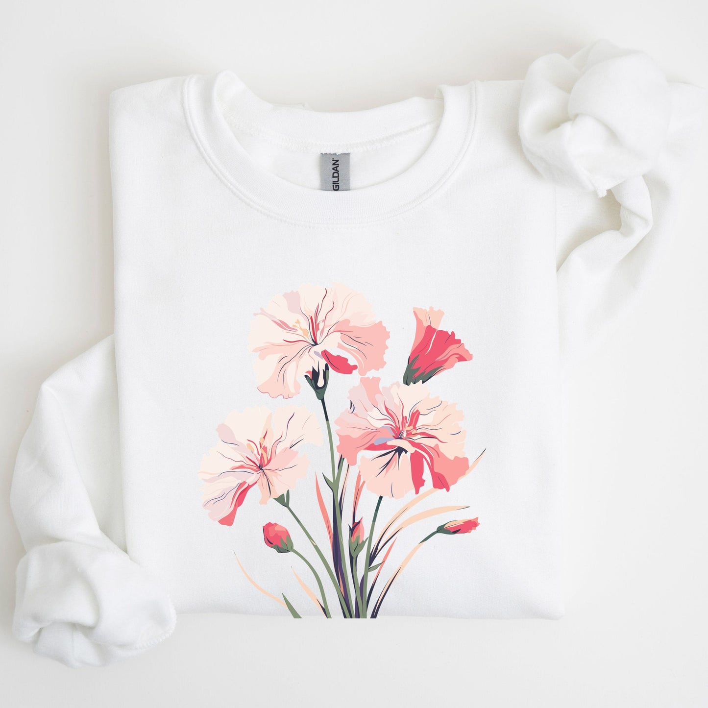 White sweatshirt with pink floral design on a light background