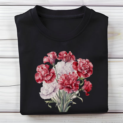 Black t-shirt with a floral design on a wooden surface