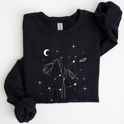 Black sweatshirt with celestial design on a white background