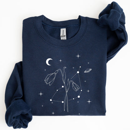 Navy blue sweatshirt with celestial design on a white background