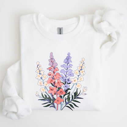 White sweatshirt with a colorful floral design on a light background