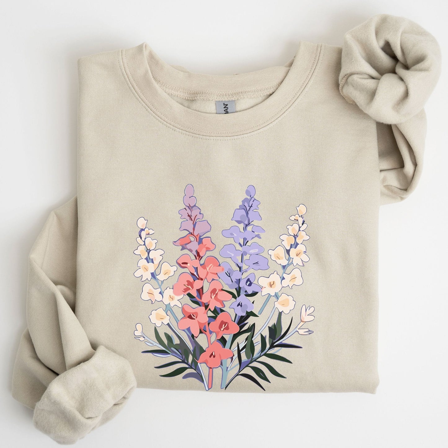 Beige sweatshirt with floral design on a white background