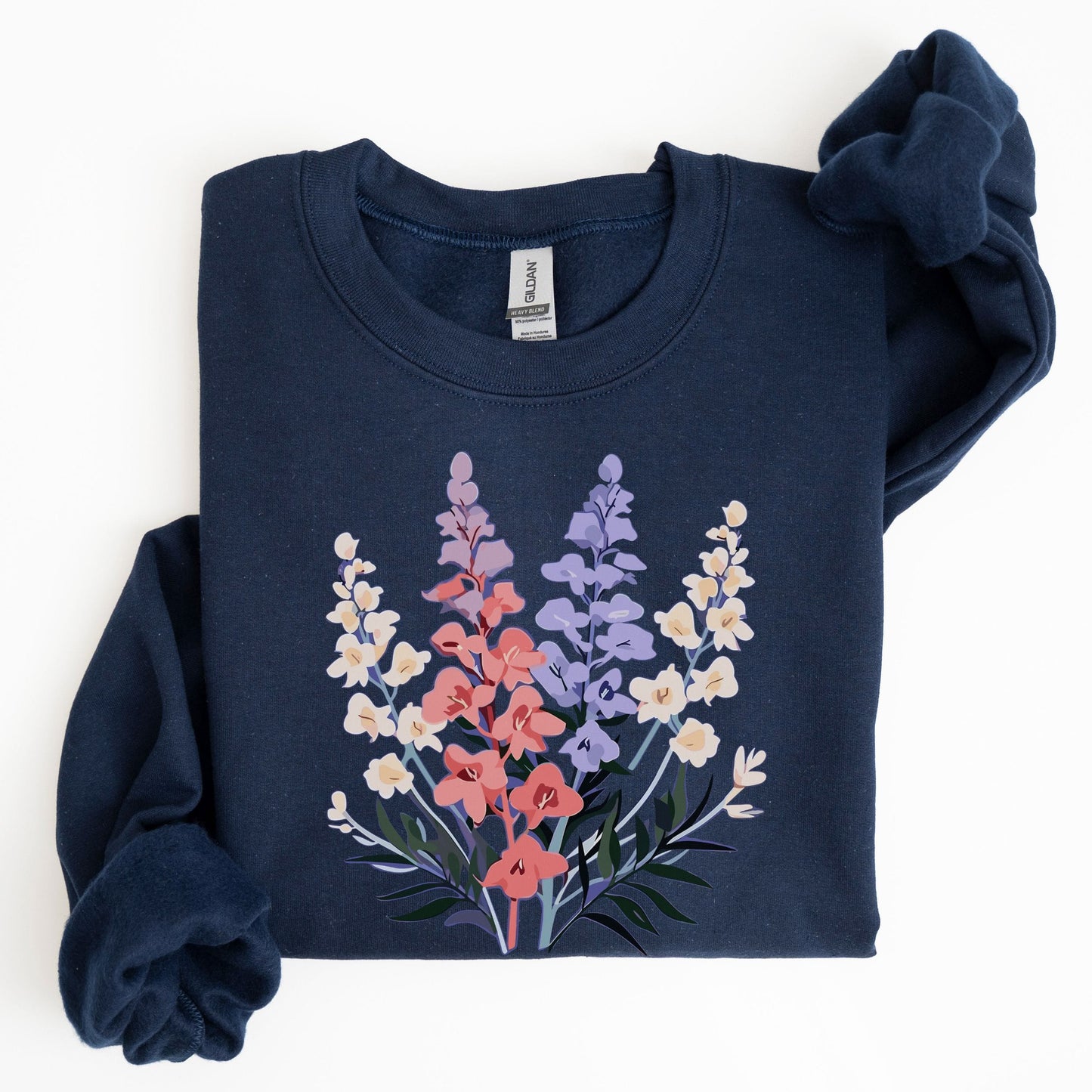 Navy blue sweatshirt with floral design on a white background