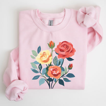 Pink sweatshirt with floral design on a light gray background