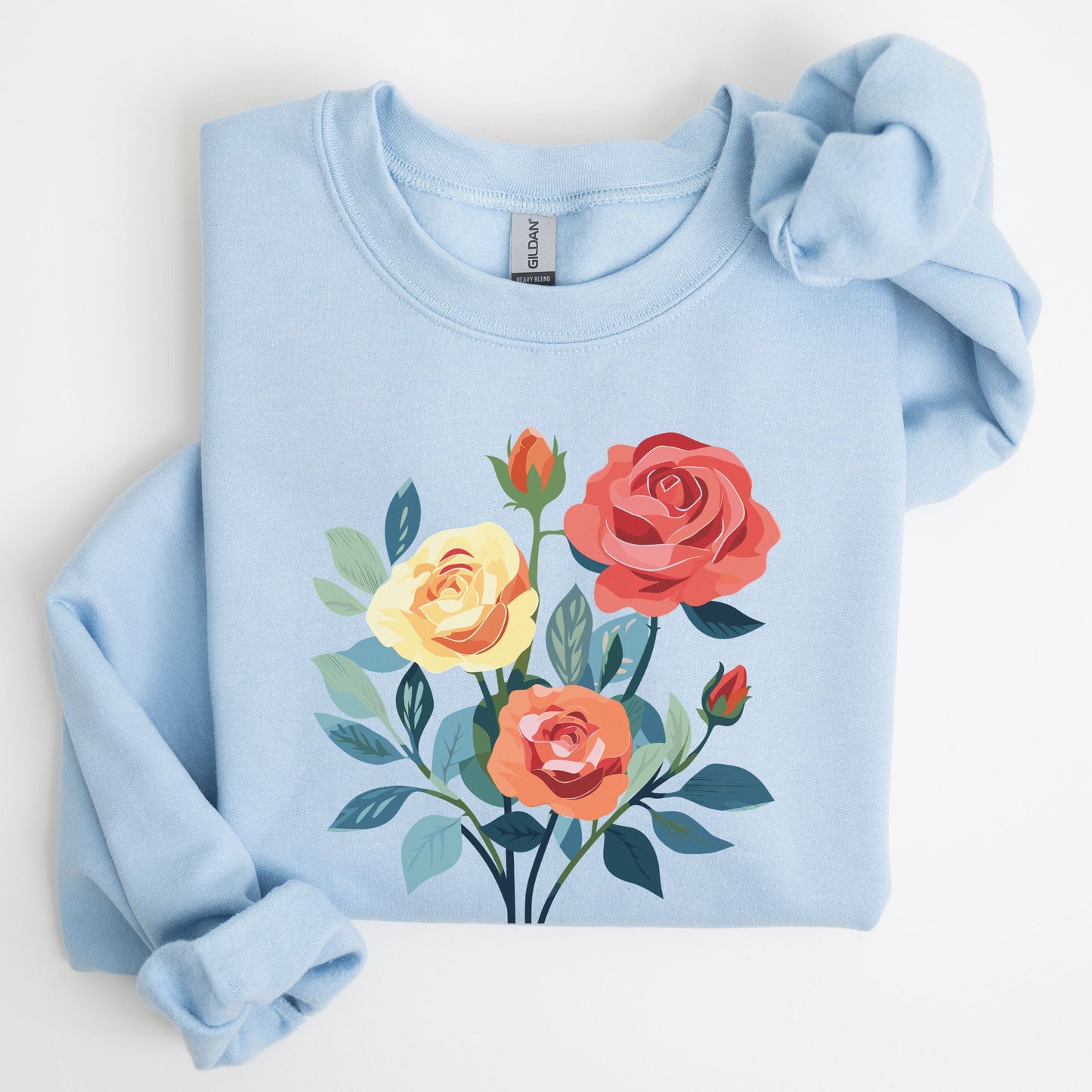 Light blue sweatshirt with floral design on a white background