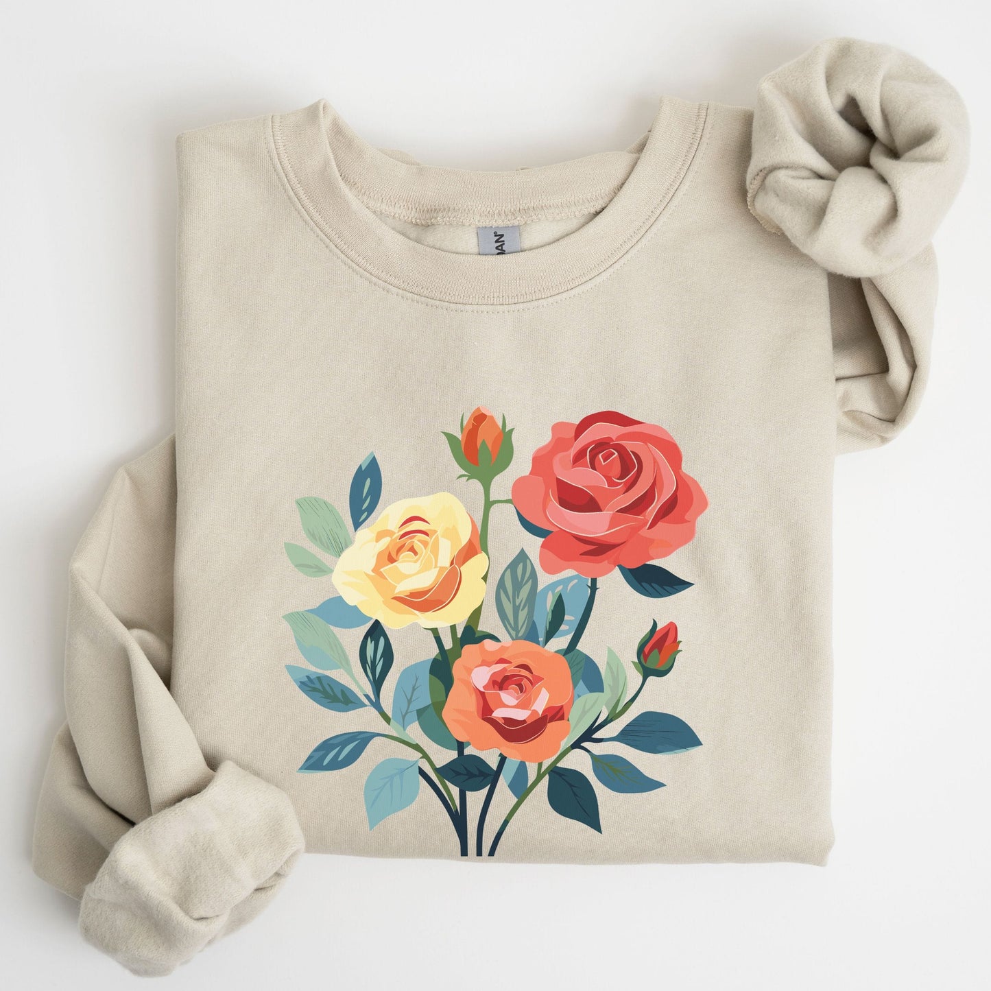 Beige sweatshirt with floral design on a white background