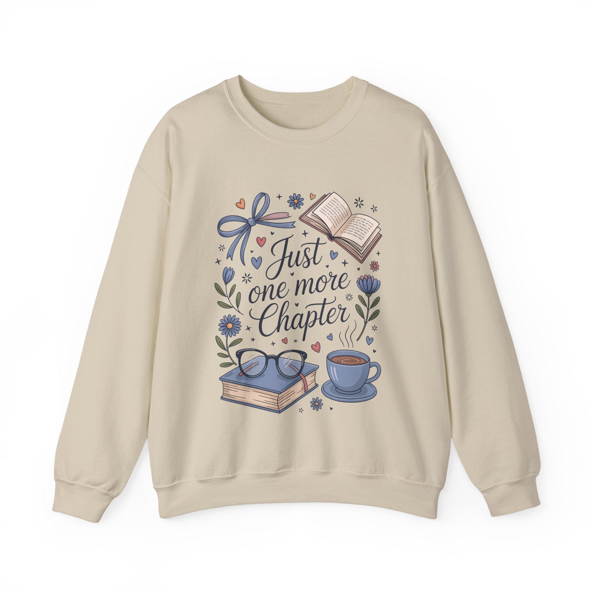 Beige sweatshirt with book-themed design and text 'Just one more chapter' on a white background