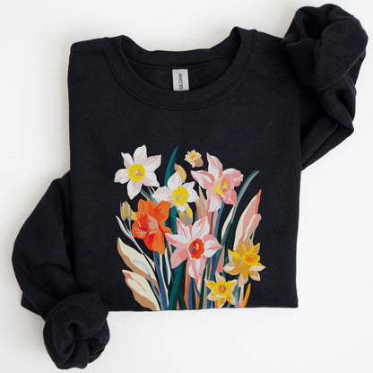 Black sweatshirt with floral design on a white background
