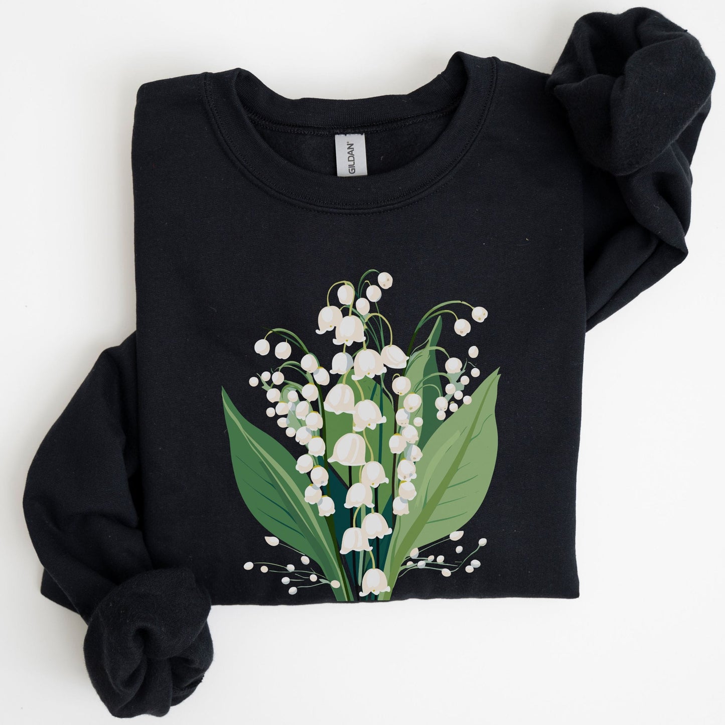 Black sweatshirt with a floral design on a white background