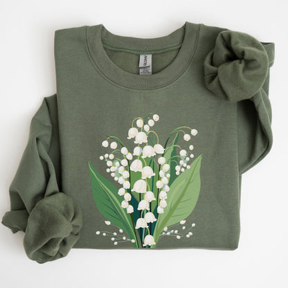 Green sweatshirt with a floral design on a white background