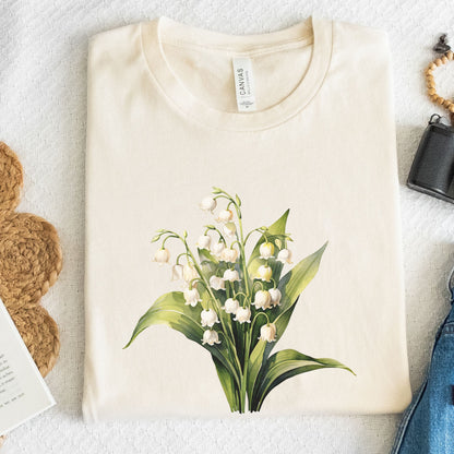 Beige t-shirt with a floral design on a textured surface