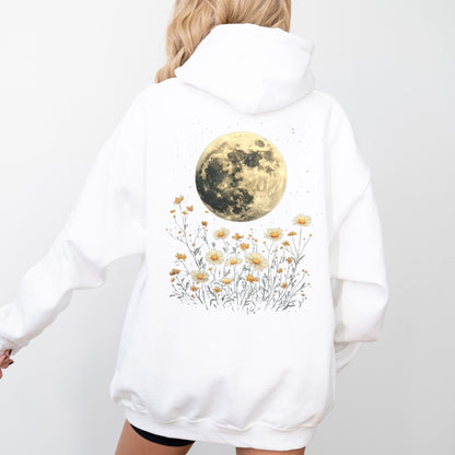 White hoodie with a moon and floral design on the back against a white background