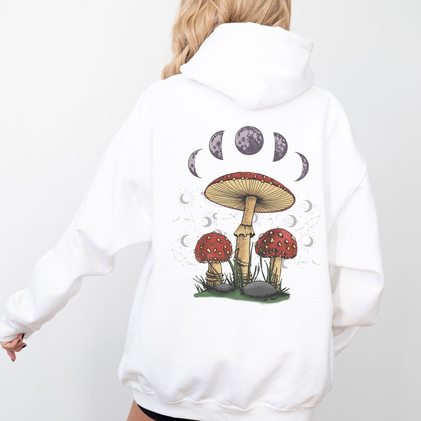 White hoodie with mushroom design on the back against a white background