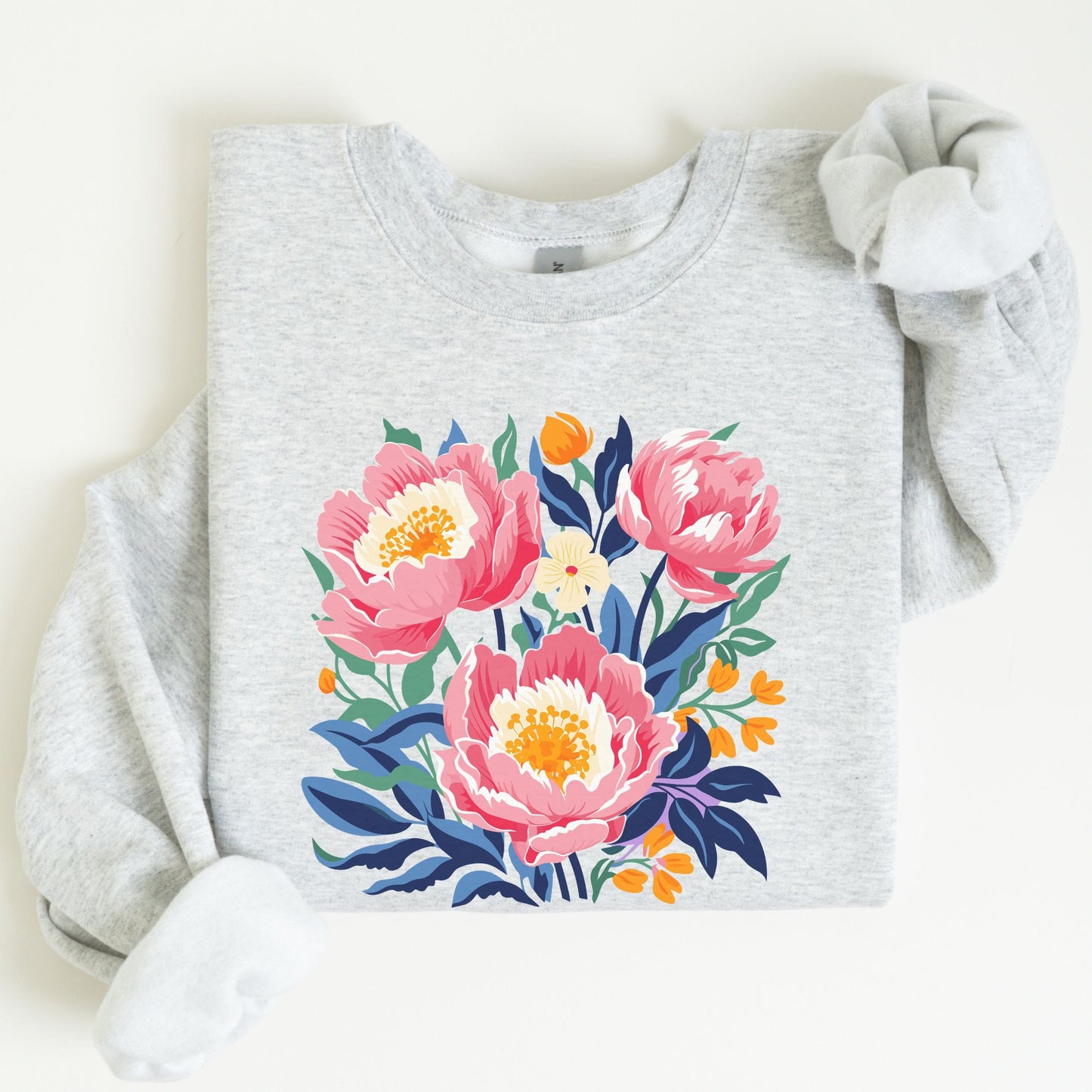 Gray sweatshirt with colorful floral design on a white background