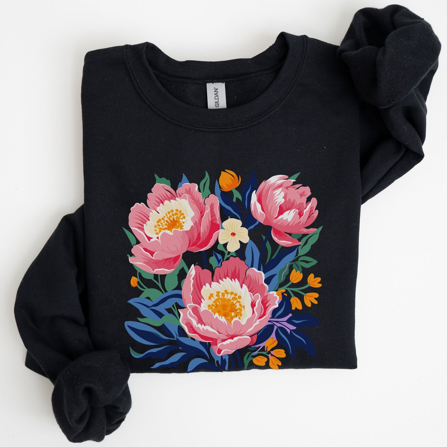 Black sweatshirt with pink floral design on a white background
