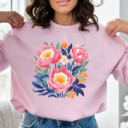 Person wearing a pink sweatshirt with floral design