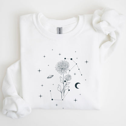 White sweatshirt with black floral and celestial design on a light background