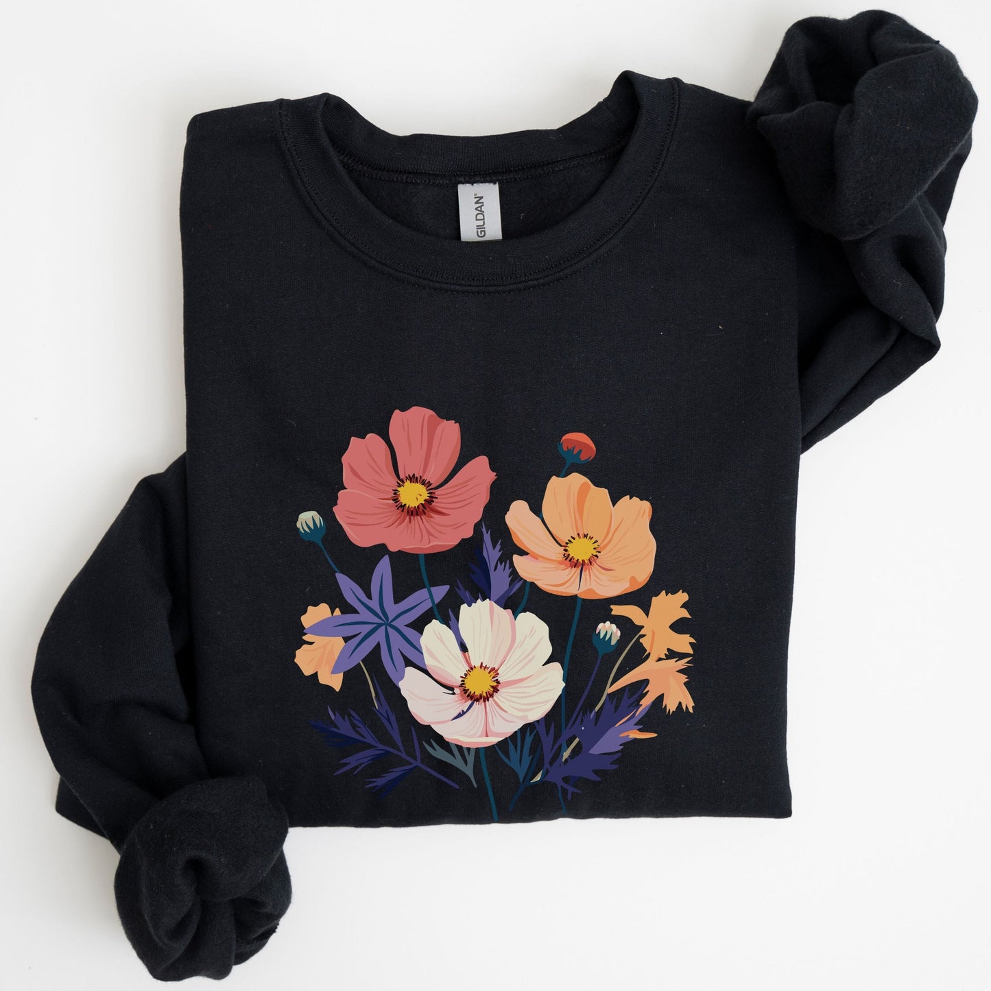Black sweatshirt with colorful floral design on a white background