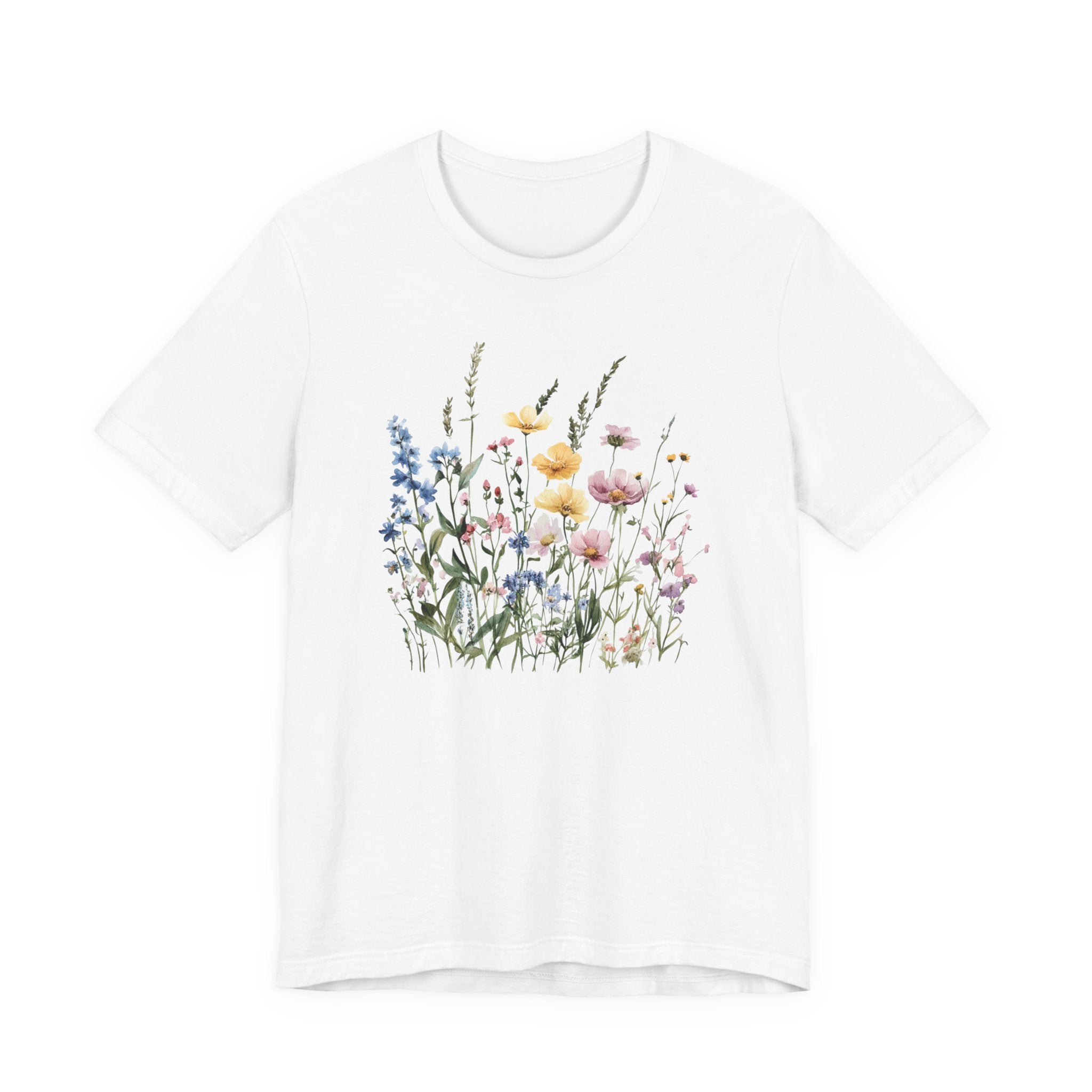 Flat lay of white t-shirt with pastel watercolor wildflowers