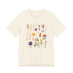 Beige t-shirt with floral design on a white background