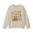 Beige sweatshirt with floral and pumpkin design on a white background