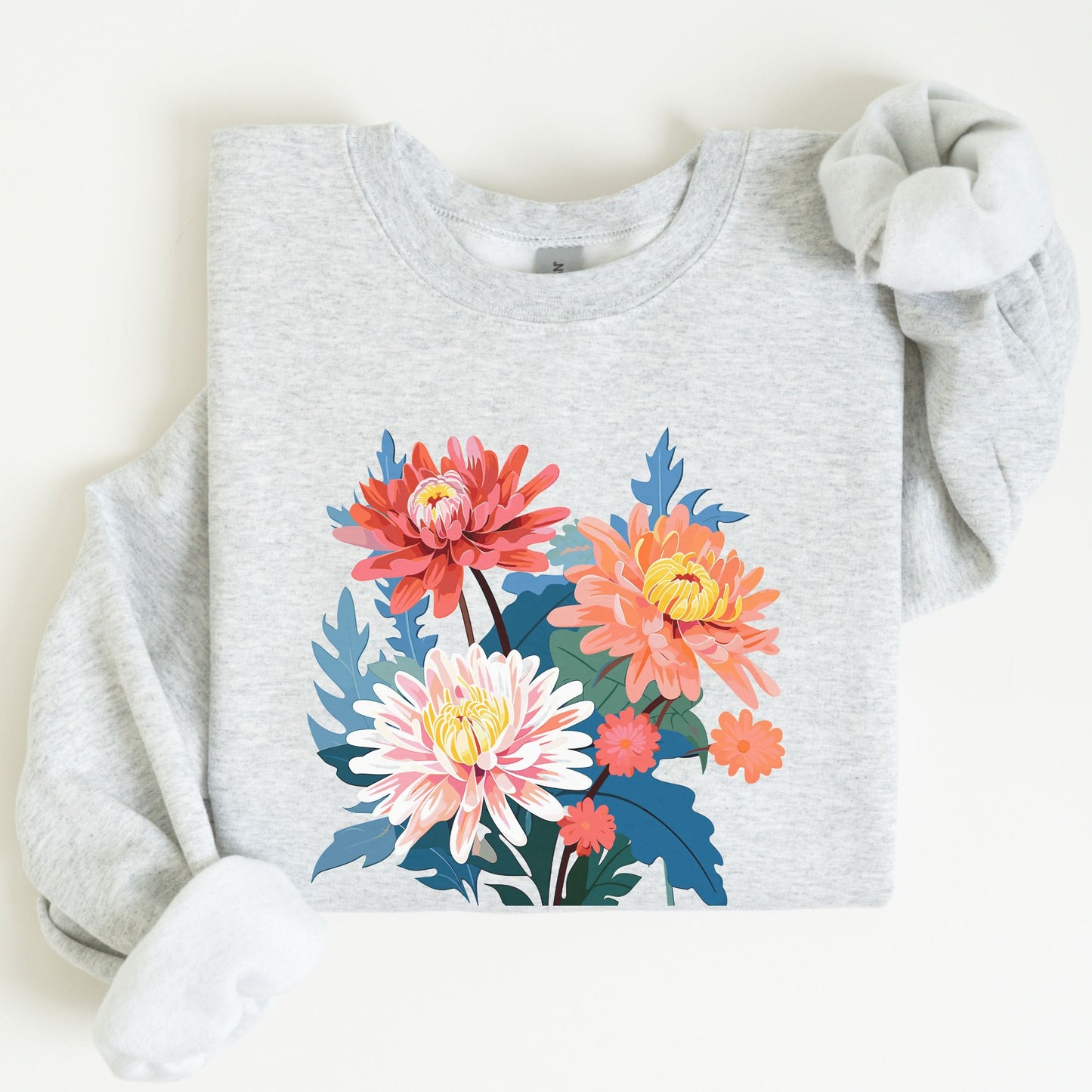 Gray sweatshirt with colorful floral design on a white background